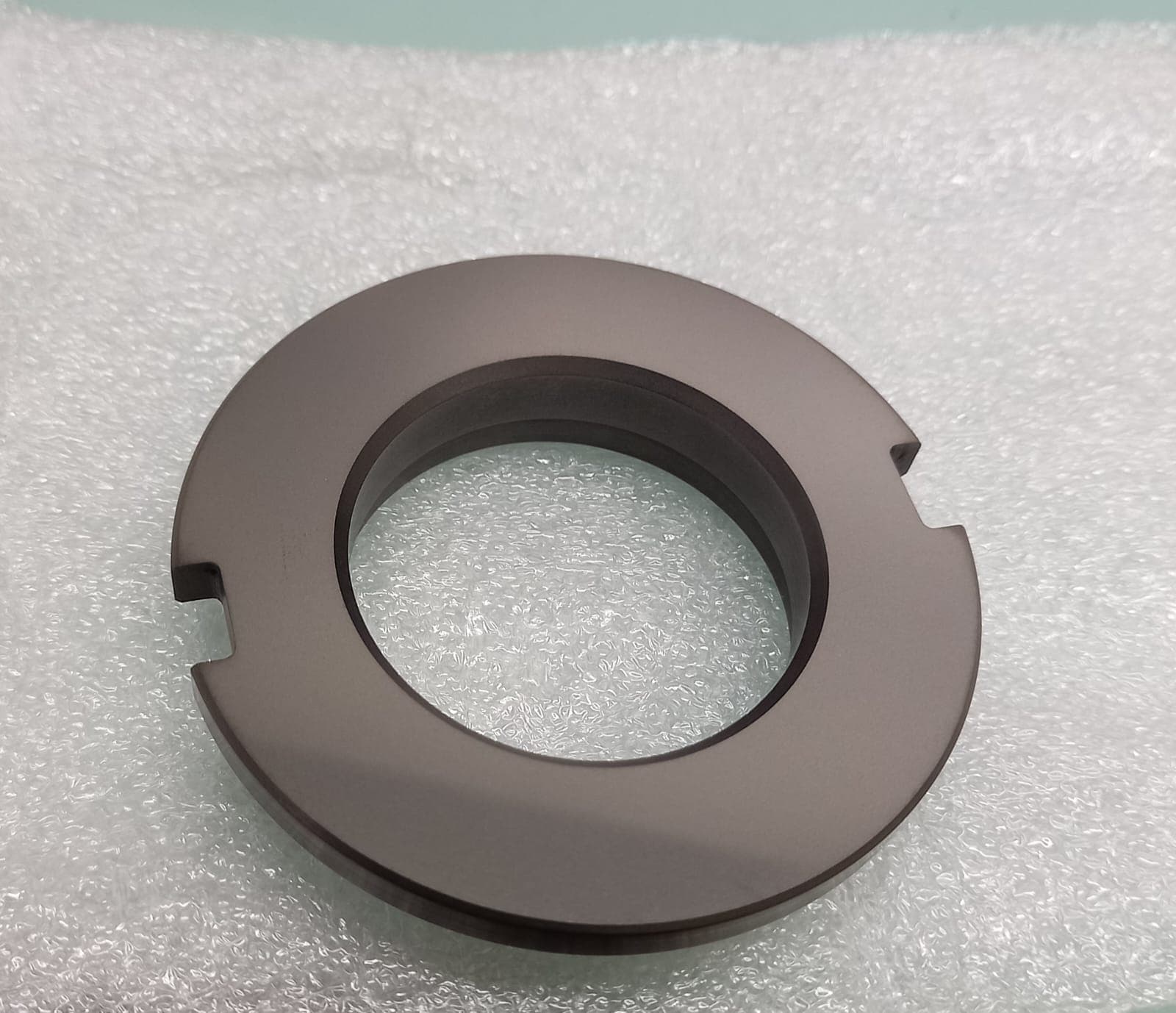 Machined carbon bearing component